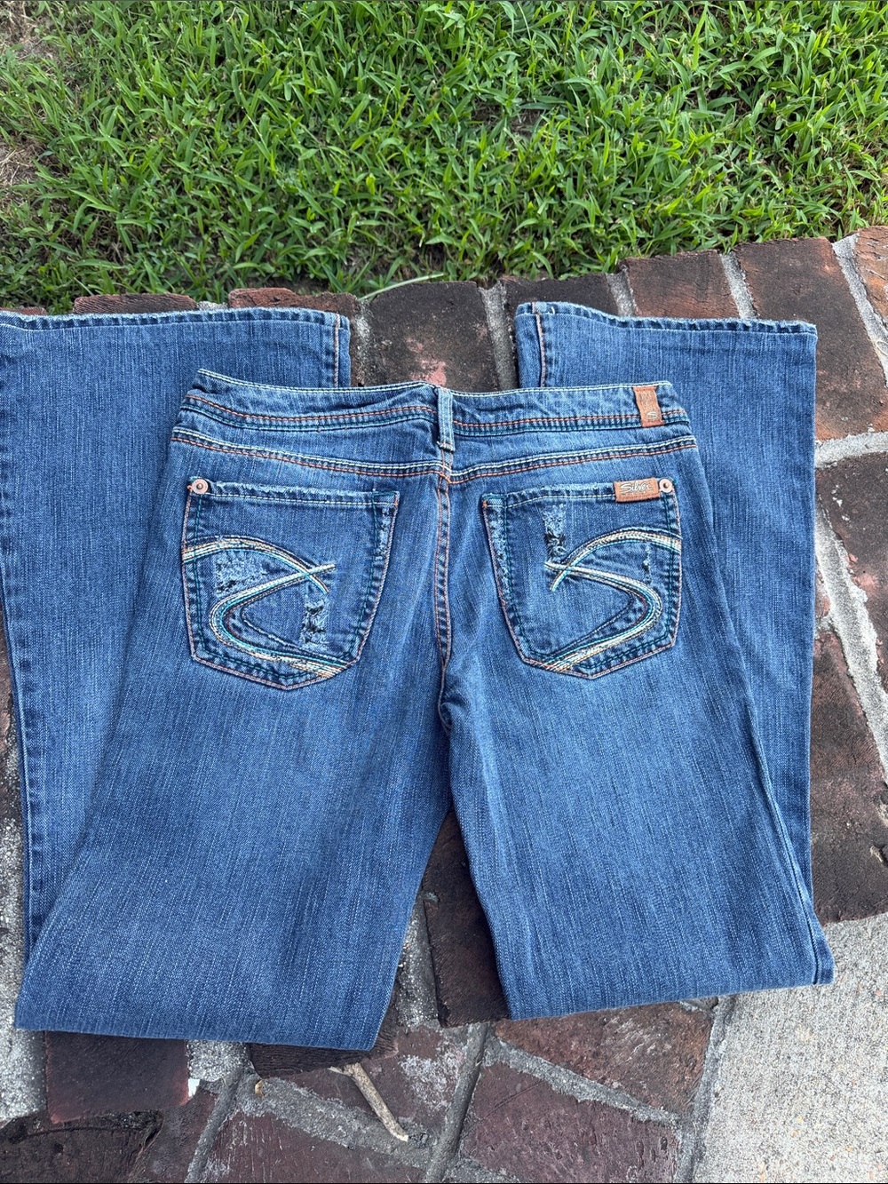 Silver "mirage" flare blue jeans *** no Size tag estimated size 30